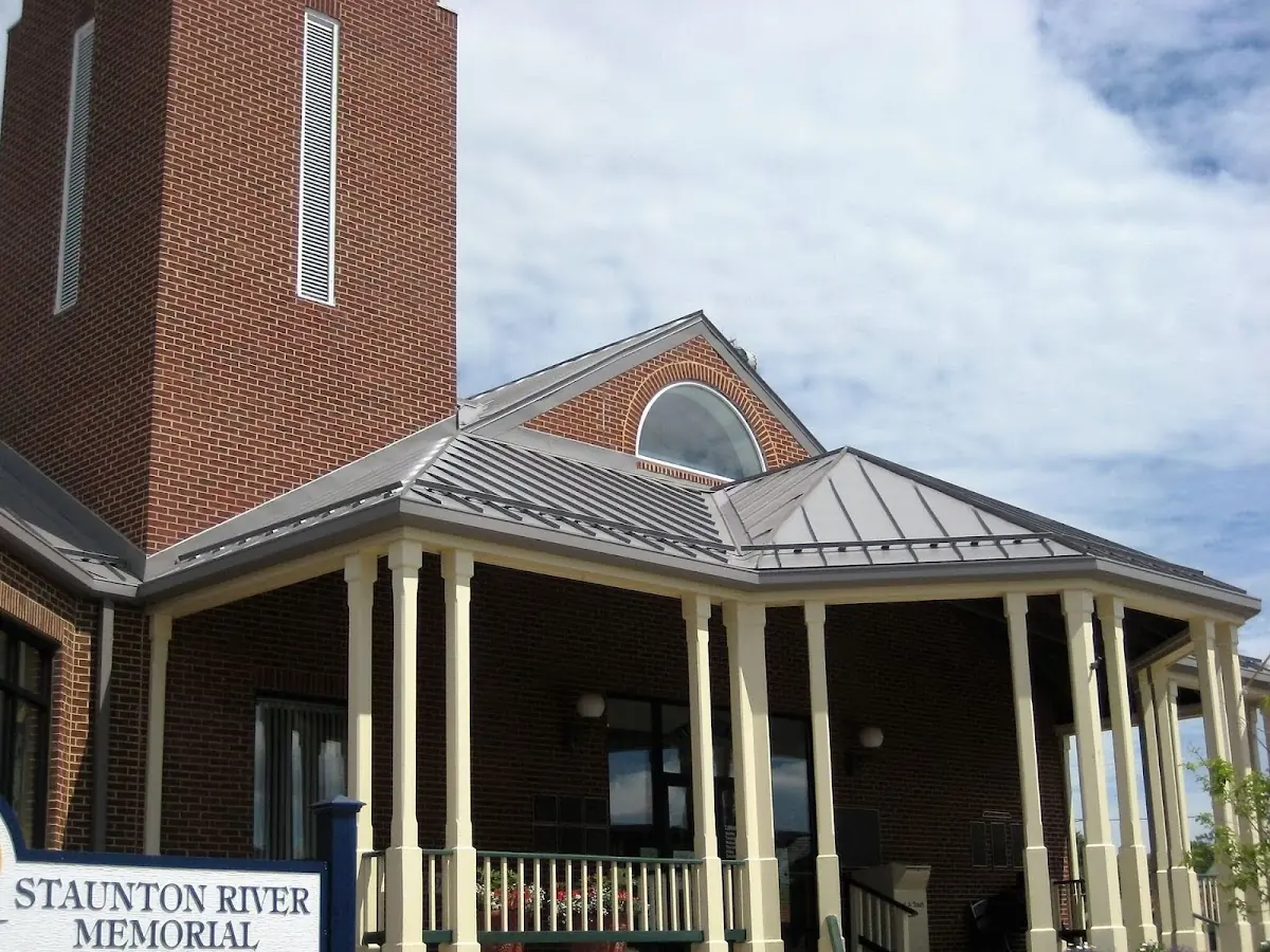 Skilled roofing craftsmen working on a residential roof in Pennsburg